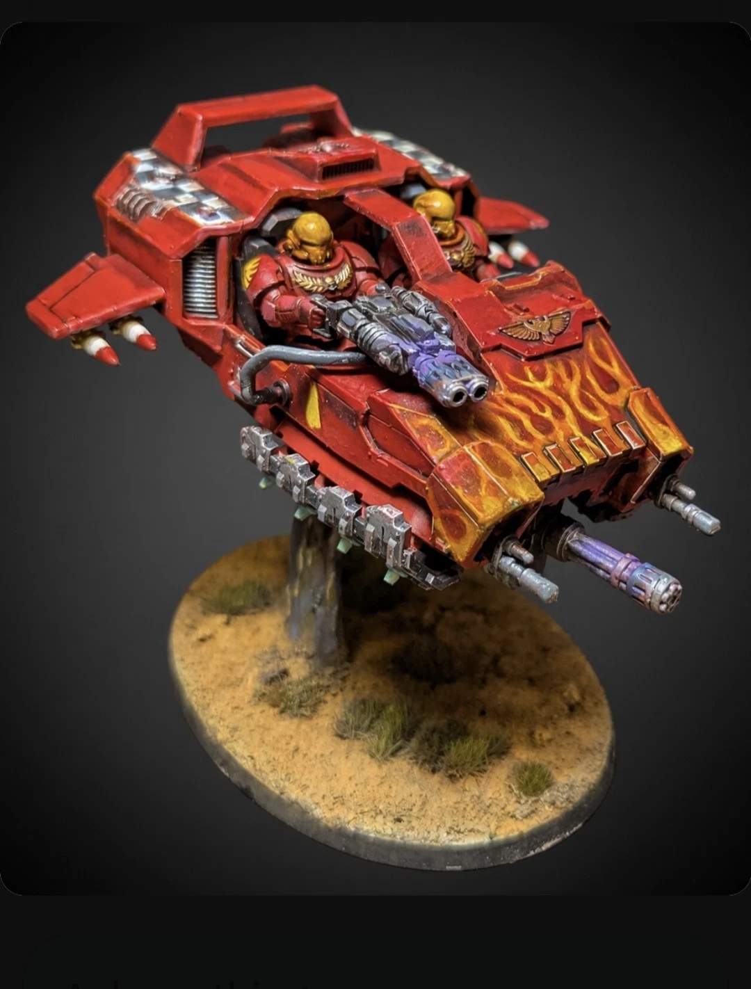 Full red Blood Angels Land Speeder with painted flame details and a scenic base.